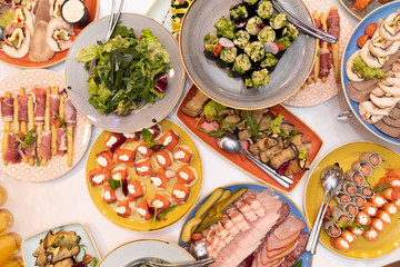 Festive table with bright snacks