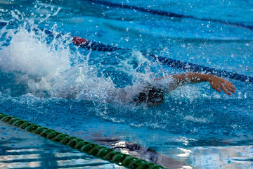 Swimmers compete in the sports pool