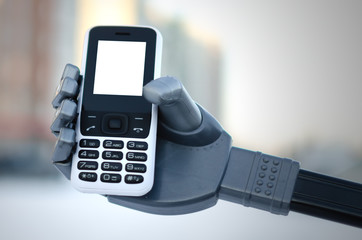 Mobile phone with blank screen in a robot hand.