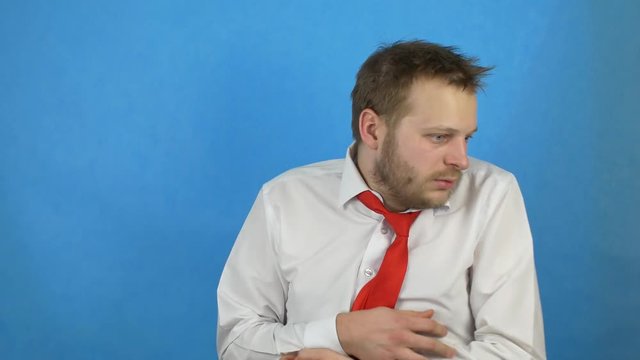 A young caucasian male alcoholic had a delirium tremor, blue background, delirium