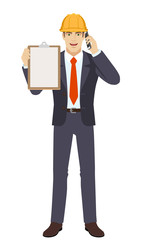 Businessman in construction helmet  talking on the mobile phone and holding the clipboard. Full length portrait of businessman in a flat style. Vector illustration.