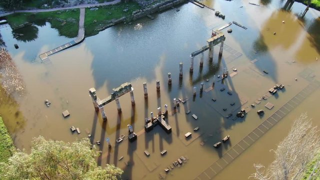 Aerial drone video of ruins of Temple and Sanctuary of Artemis in archaeological site of Vravrona at winter time, Attica, Greece