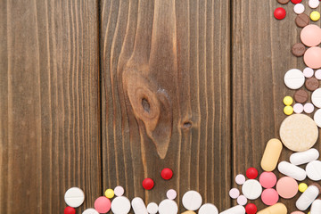 many tablets wooden background