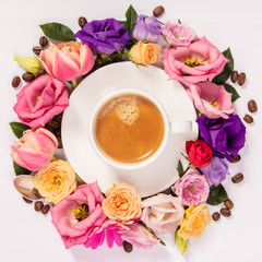 Obraz na płótnie Canvas Morning coffeeand a beautiful flowers . Flat lay style.