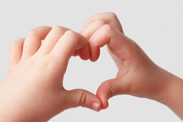 Heart shape from the fingers of a child