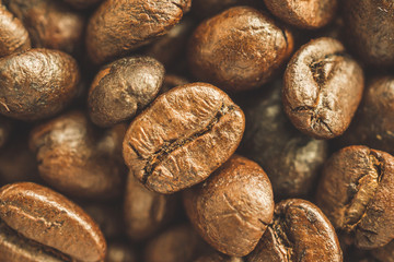 Roasted coffee beans closeup background