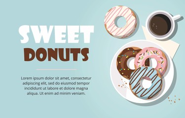 Donuts and cup of coffee on the blue background. Top view