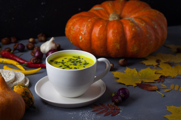 Pumpkin asian coconat cream soup. Autumn hot food