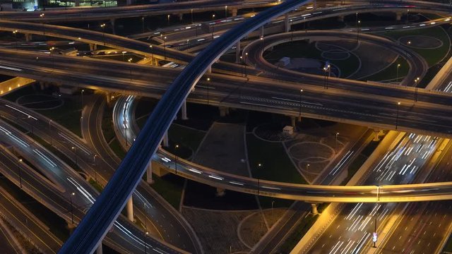 Timelapse of evening traffic on complex interchange on Dubai highway