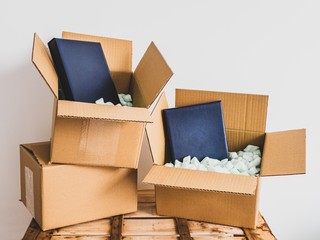 Open delivery boxes ready to send