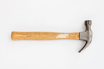 The vintage old hammer tool for the wood working job, Carpenter tool on the white background - vintage industrial tool concept image