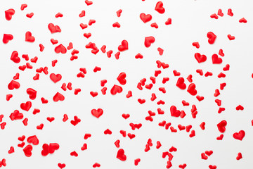 Fototapeta na wymiar Valentines day background red hearts on wooden background.