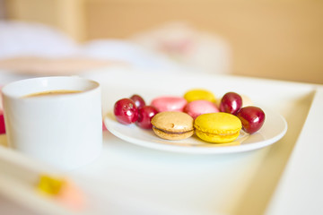 Obraz na płótnie Canvas Romantic breakfast with macarons and coffee