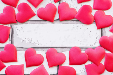 Postcard on a wooden background, decorated with hearts. Decorative card for the holiday. Vanentine...