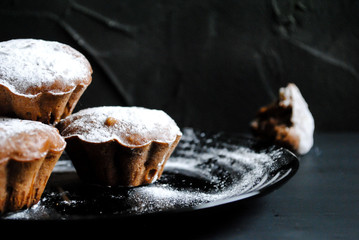 Muffins are filled with powdered sugar