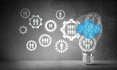 Cloud from gears inside lightbulb.