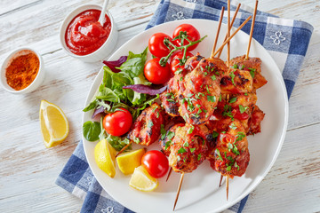 chicken kebab grilled on skewers, top view