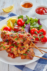 chicken kebab grilled on skewers, top view
