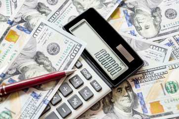 Fototapeta premium calculator, dollar and pen