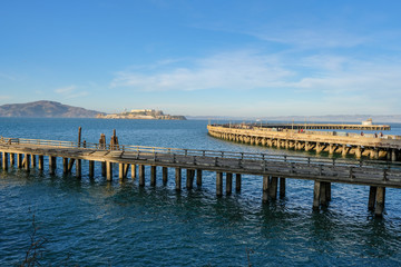 Fototapeta na wymiar Old wooden piers near Alcatraz