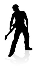 A guitarist musician in detailed silhouette playing his guitar musical instrument.