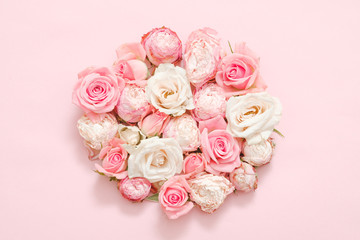 Flower gift concept. Delicate roses on pink background.