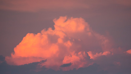 red storm clouds forming background picture