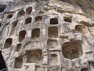 Luoyang Longmen grottoes. Broken Buddha and the stone caves and sculptures in the Longmen Grottoes in Luoyang, China. Taken in 14th October 2018