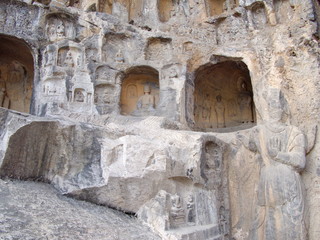 Luoyang Longmen grottoes. Broken Buddha and the stone caves and sculptures in the Longmen Grottoes in Luoyang, China. Taken in 14th October 2018