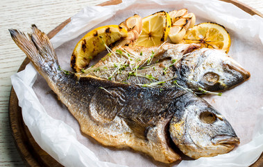 Dorado fillet on a wooden board