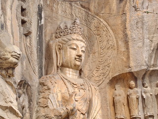 Luoyang Longmen grottoes. Broken Buddha and the stone caves and sculptures in the Longmen Grottoes in Luoyang, China. Taken in 14th October 2018