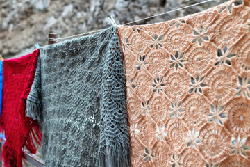 Downy shawls of different shapes and colors
