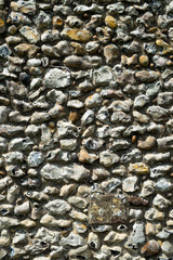 Decorative flint built wall on Cranbourne village church, Dorset, UK.  Full frame background texture.