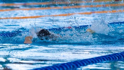 Swimmers compete in the sports pool