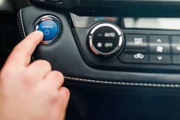 Fototapeta premium Car driver starting the engine.