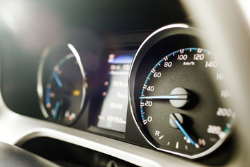 Naklejka premium Hybrid car dashboard speedometer .