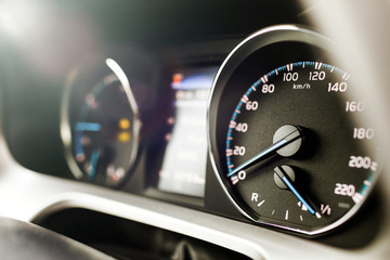 Hybrid car dashboard speedometer .