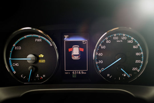 Hybrid car dashboard speedometer .