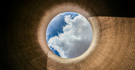 View up a coal burning power plant cooling tower - obrazy, fototapety, plakaty