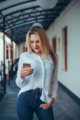 Fototapeta premium woman using smartphone