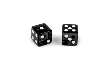 Two black glass dice isolated on white background. One and five.