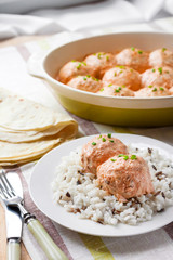 Chicken meatballs in creamy tomato sauce with rice