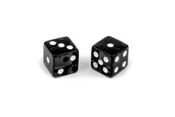 Two black glass dice isolated on white background. Three and one.