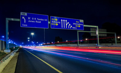 Obraz premium Motorway Signs on Highway at night