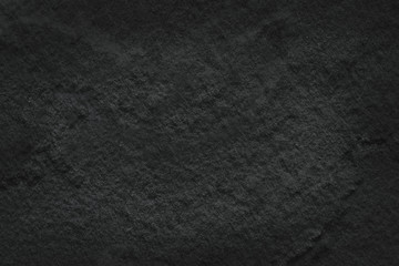Black stone texture natural patterns abstract for background , dark black slate