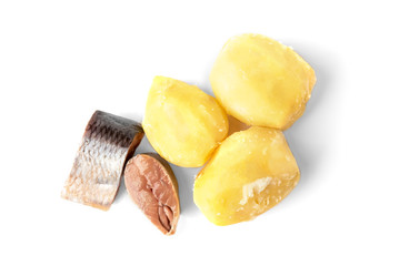 Salted herring and boiled potatoes isolated on white background.
