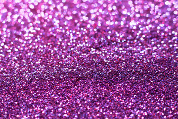 Blue glitter texture. Festive sparkling sequins background closeup. Wpaper for Valentine, New Year or Christmas Holidays