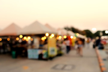 Colorful gold yellow bokeh sparkle and blurred image at  food night street market evening orange...