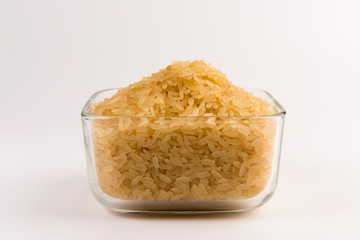 white rice in bowl isolated on white background