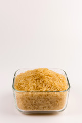 white rice in bowl isolated on white background